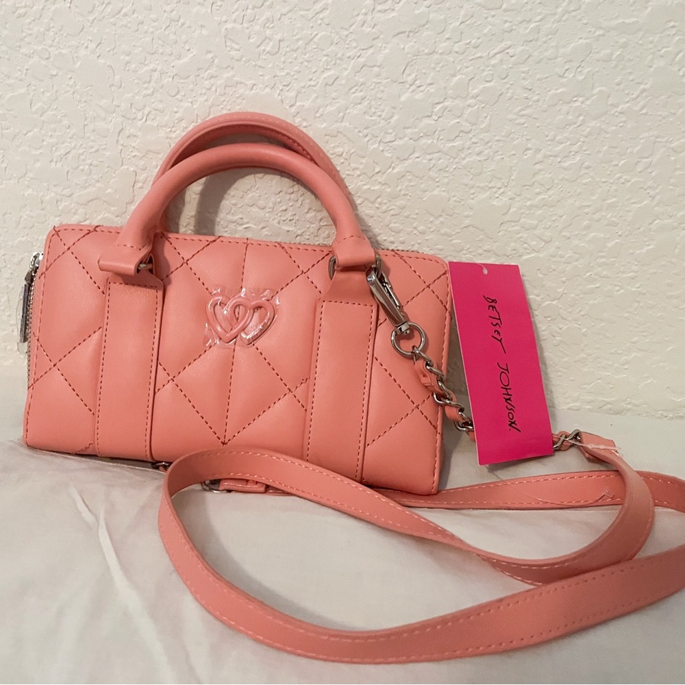 Betsey Johnson Coral color purse new with tags.
